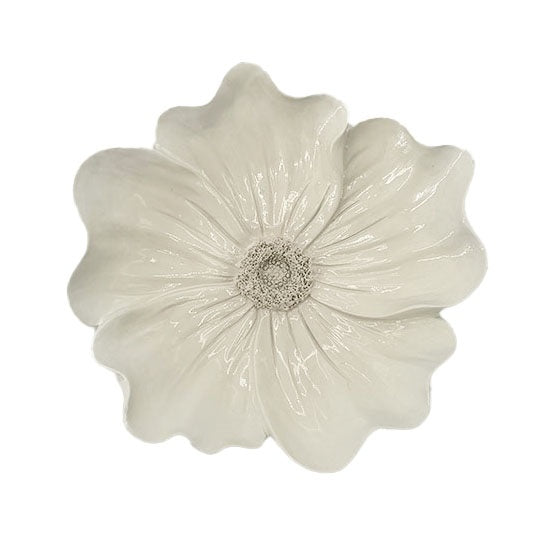 bloem voor aan de muur beige
